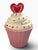 Whimsical vintage Nantucket Home ceramic cookie jar designed in the shape of a frosted cupcake. The piece features a soft...