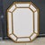 This is a pair of Hollywood Regency Era carved giltwood faux bamboo mirrors. They are Italian and unmarked. They have...