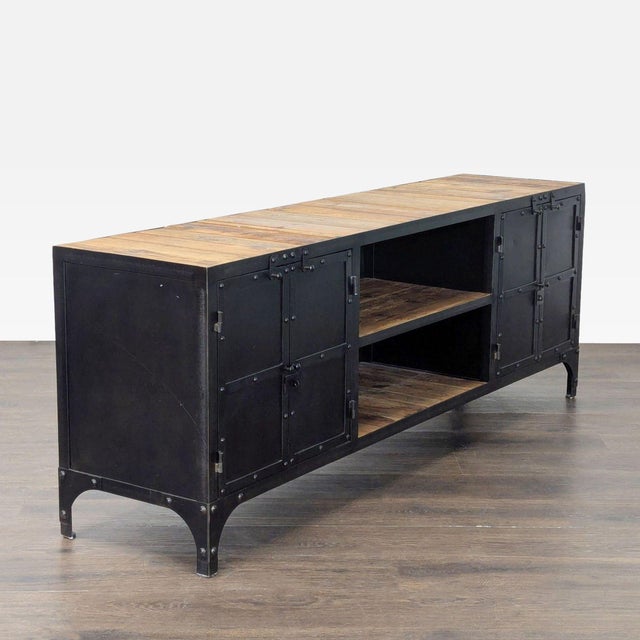 This media console combines rustic reclaimed wood with black metal, giving it a modern industrial look. It features two...
