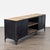 This media console combines rustic reclaimed wood with black metal, giving it a modern industrial look. It features two...