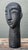 This compelling vintage ceramic bust is a masterclass in stylized abstraction, drawing inspiration from both West African...