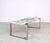 A distinctive vintage coffee table from the 1960s, manufactured by Denisco. The tabletop features hand-painted ceramic...