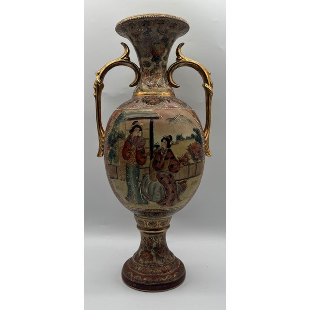 An imposing and highly decorative antique Japanese Satsuma ceramic vase from the late Meiji period (c. 1890–1910)....