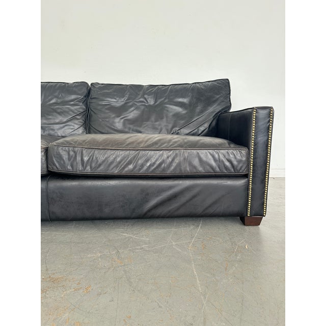 Timeless comfort. Contemporary lines, casual cushioning, and clean track arms are covered in genuine top-grain leather...