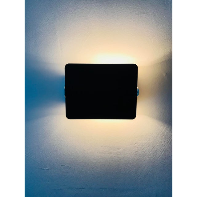 Charlotte Perriand plastic CP-1 sconce light. Designed by Charlotte Perriand for Les Arcs 1600. The body is white plastic...