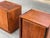 Pair of walnut nightstands by Merton Gershun for Dillingham, c.1960s, USA. The nightstands each feature a single door...