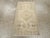 This Early 20th century Turkish Oushak rug, measuring 1' 7" x 2' 11", reflects the understated sophistication and artistic...