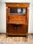 This elegant French Empire secrétaire abattant captures the refined architectural presence and restrained grandeur that...