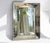 A large Venetian rectangular mirror with beveled glass. The mirror has a beautiful frame with engraved details .The main...
