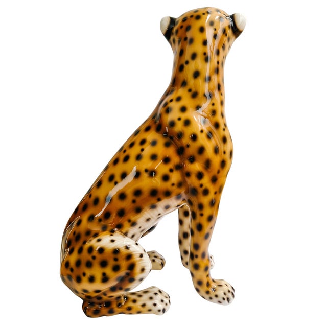 A fantastic vintage Italian glazed ceramic leopard statue. This is a very realistic hand-made and hand-painted rendition...