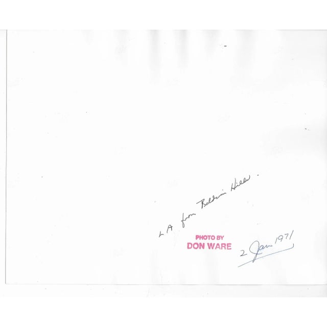 1984 black and white photograph by Los Angeles photographer Don Coleman Ware (1921-2006) of Avenue Champs Elysees. Titled,...