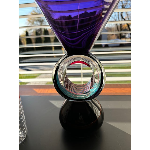 Exquisite pieces of Correia art glass. Stands 14” tall and the crowning bowl is 13” in diameter. The deep, crisp purple is...