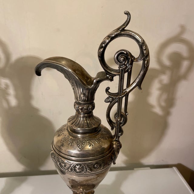 Fabulous pair of 19th Century silvered bronze renaissance revival grand tour ewers or pitchers with Foliate design based...