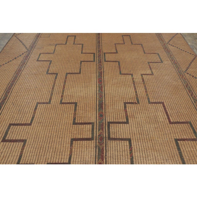 This 9x11 vintage Moroccan Tuareg mat is a celebrated new addition to Rug & Kilim’s Moroccan collection, handwoven from...