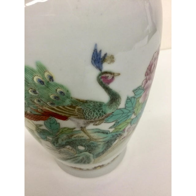 Mint condition this little Vase is from China. These are becoming more and more scarce in this fine condition. The peacock...