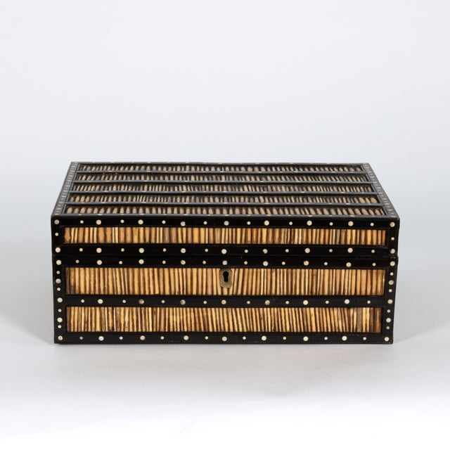 Handsome Anglo Indian large scale ebony and quill box with mother-of-pearl dot inlay decoration; India made for an English...