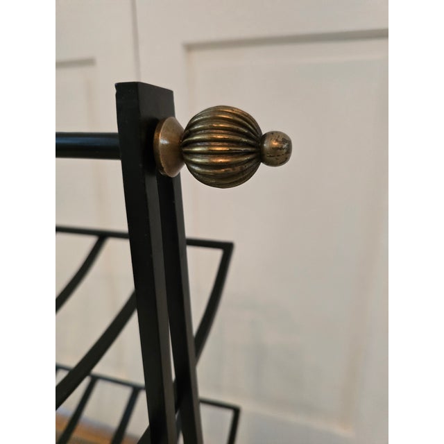 A true vintage original mid century modern Italian three tier rack . Superior quality wrought iron construction with...