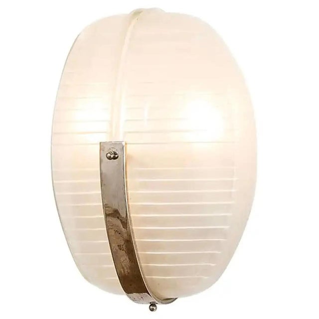 This striking pair of "Lambda" wall sconces, designed by Vico Magistretti for Artemide in 1961, represents a definitive...