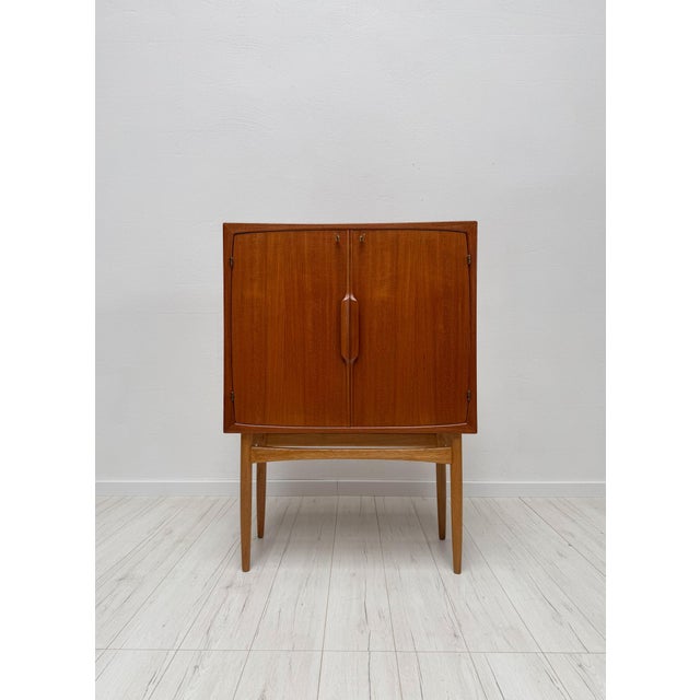 Elegant bar cabinet model bacchus designed by torbjørn afdal and produced by mellemstrand møbelfabrik in norway during the...