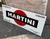Original vintage Martini advertising sign. Beautiful enamel sign with the classic Martini logo (red circle and black...