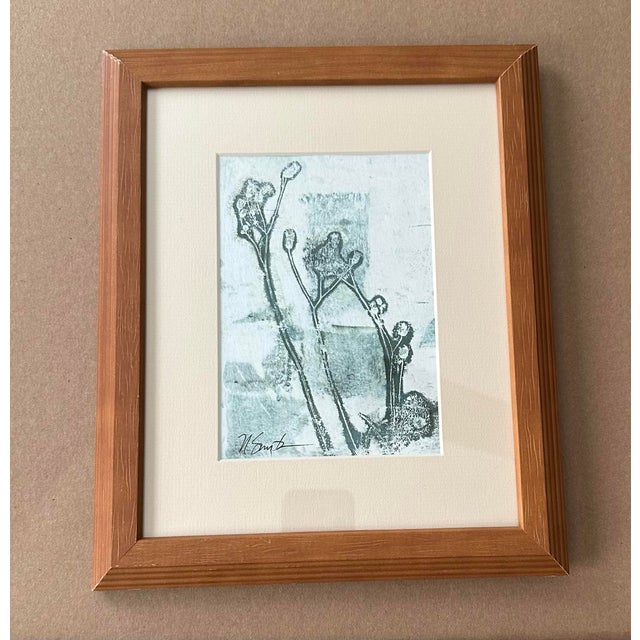 Delicate and atmospheric, this original botanical monoprint captures the graceful silhouettes of wild meadow stems in soft...