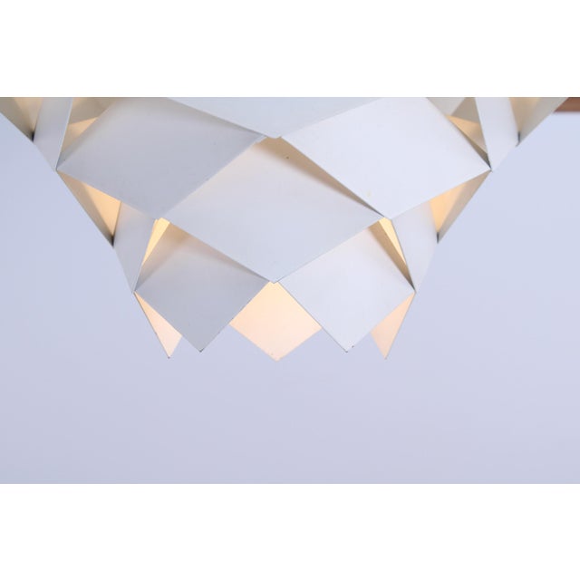 Original ‘symfoni’ ceiling lamp by preben dahl for h. Følsgaard elektro, copenhagen. The metal facets in blue-grey and...