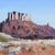 This artwork depicts the rugged beauty of the Moab plateaus, showcasing expansive landscapes characterized by bold,...