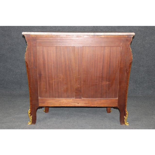 This exquisite Breche D’Alep marble and bronze-mounted buffet is a masterful example of 19th-century French craftsmanship,...