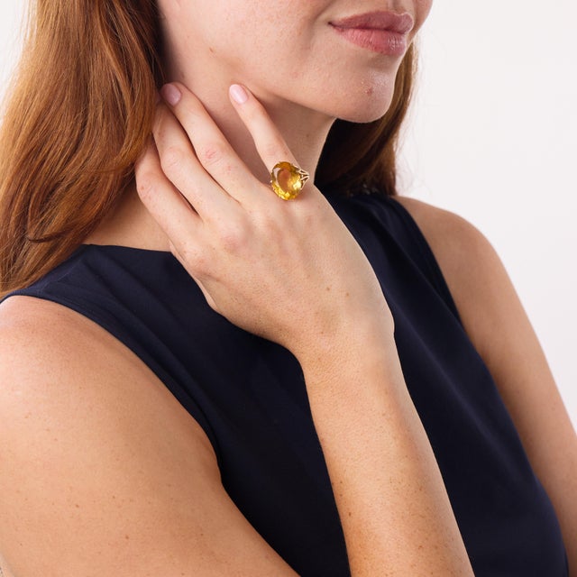 Center stone: Oval cut citrine Weight: Approximately 14.00 carats Metal: 14k yellow gold Era: Vintage Circa: 1970's...