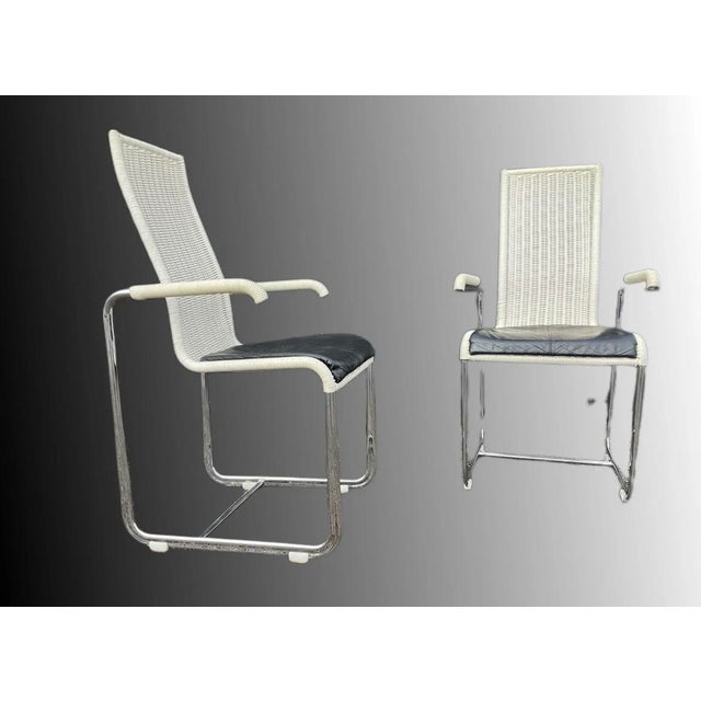 In used vintage condition. These chairs are from Germany, period is circa 1980-1999 and designed by Axel Bruchhäuser for...