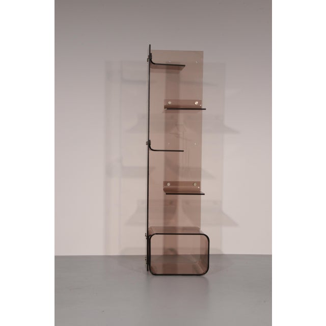Space Age French Acrylic Glass Bookcase from Michel Dumas, 1970s, in Flawless conditions. Designed 1970 to 1979 This piece...