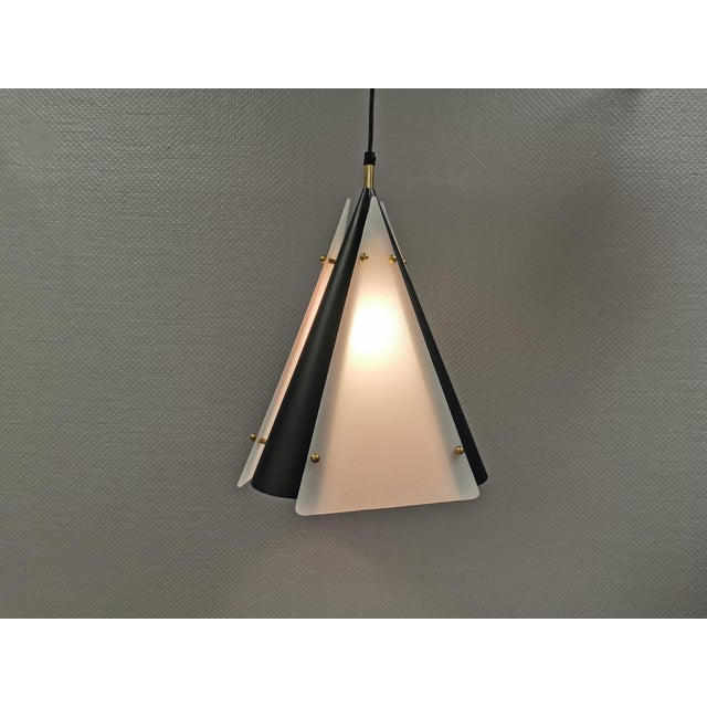 An extremely rare Teknika Denmark hanging lamp from the 1960s. So beautiful and decorative, made from acrylic and metal,...