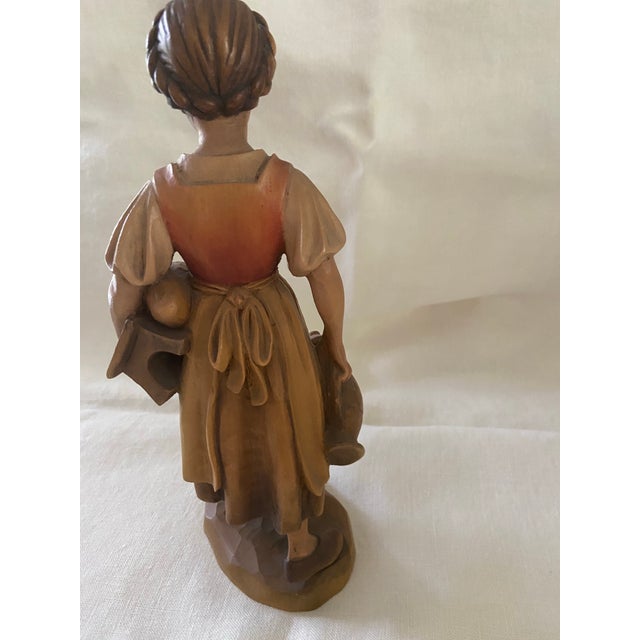 Anri handcarved wood with painted finish. Designed by Ulrich Bernardi.
