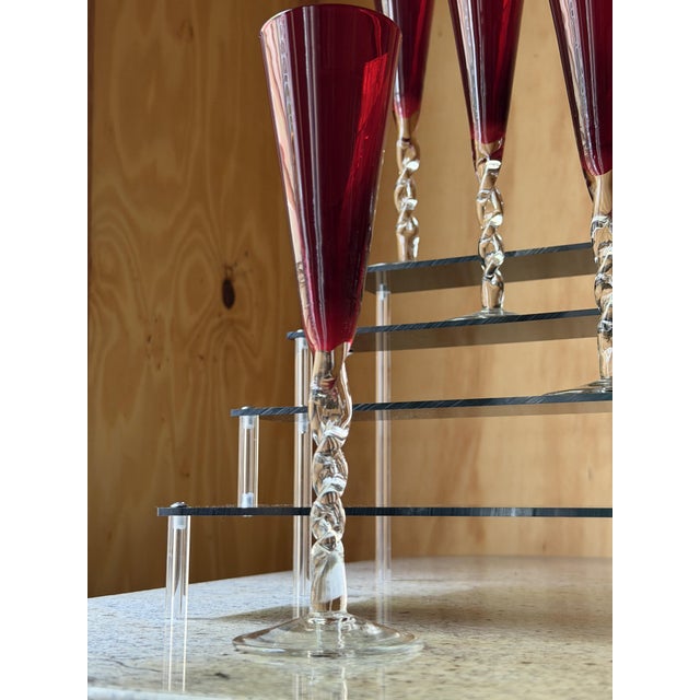 Elevate your celebrations with this rare set of 5 authentic Murano champagne flutes. These are not factory-molded; each...
