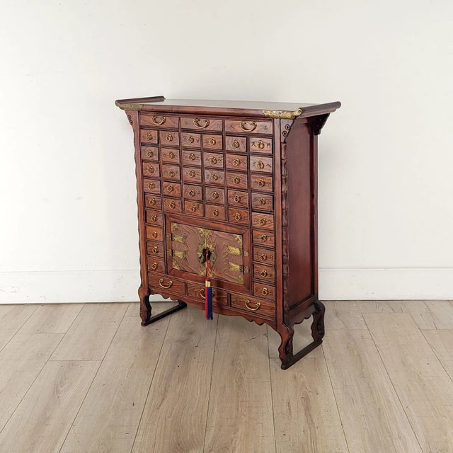 A 19th-century Chinese medicine cabinet in elm.