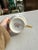 1970s Creamer Cup and Saucer With Gold and Leaf Accents For Sale - Image 4 of 9