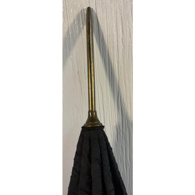 Love this u,brella from Paris! I have not opened all the way due to the possibility of tearing