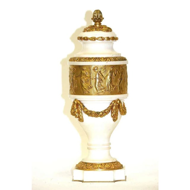 Spectacular! an important rare pair of 19th century Louis XVI neoclassic white marble cassolettes with a centre gilt...