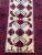 Nice 20th century Afghan rug with a geometric design and beautiful colors with beige, red, green, purple and black,...