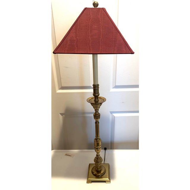 Neoclassical Frederick Copper slender brass candlestick table lamp. Heavy solid brass base with pyramid maroon moire...