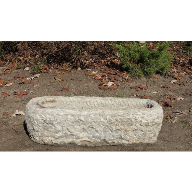 This stone trough is retrieved from the village in northern China. It is hand carved out one piece of stone and hand...