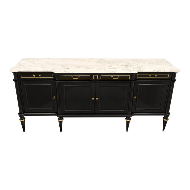 Buffet from France in the Louis XVI style. This enfilade is made of solid wood construction, primarily mahogany. It has...