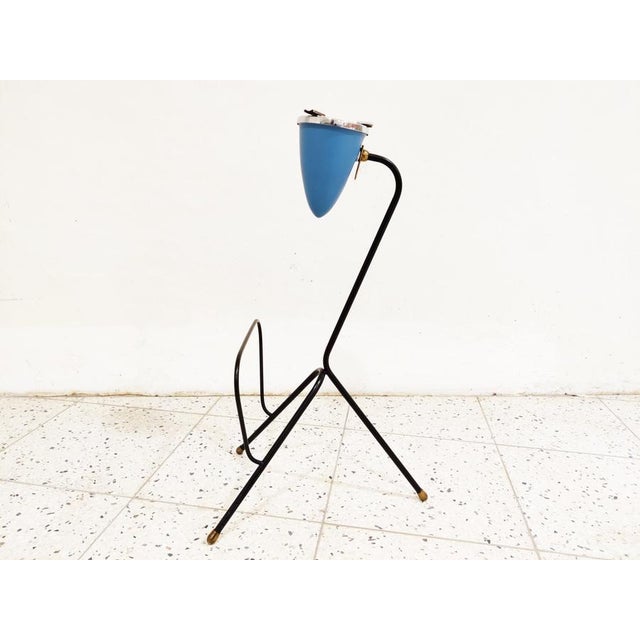 Atomic midcentury ashtray with magazine holder. Beautifully shaped with brass feet and a blue and chrome ashtray. Very...