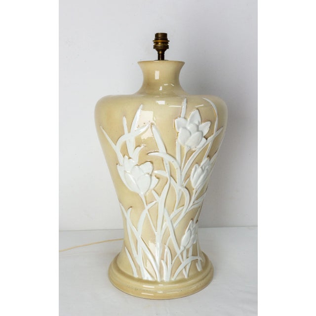 Ceramic table lamp representing vegetation and flowers. Elegant lamp for a dining room a living room or an entrance,...