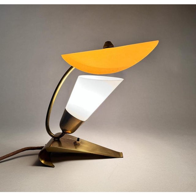 Unique art deco table lamp made of brass and milk glass with original plastic shade. Rarely seen in this original...