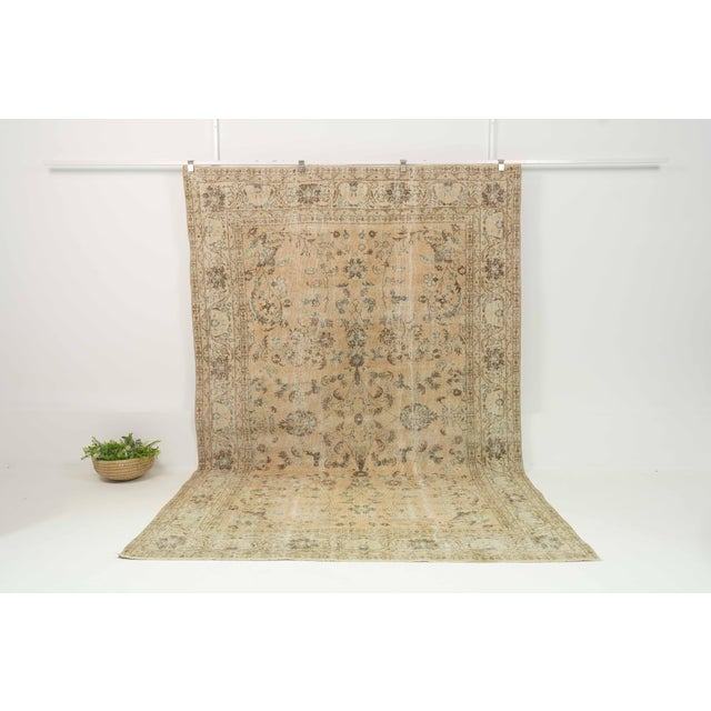 Vintage Hand-Knotted area rug is a semi-antique vintage area rug. The '70s Eastern region of Anatolian's unique rug is...