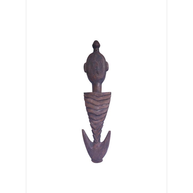 This item is a traditional Papua New Guinea suspension hook (known as samban) from the Sepik River region, typically...