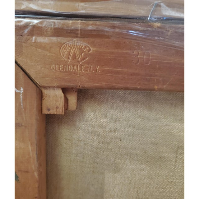 Pictured is a large framed piece which portrays a collage of nude women at different angles with different expressions...