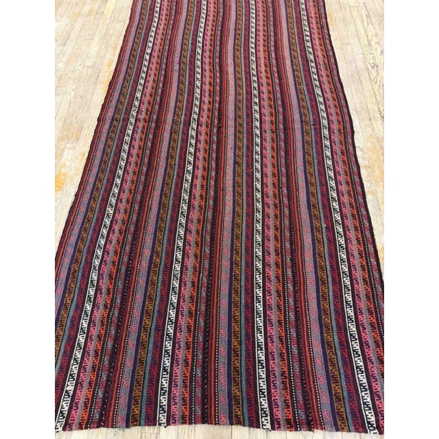 this mid-20th-century Turkish Decorative textile is an exceptional example of Anatolian tribal flat-weaving craftsmanship....