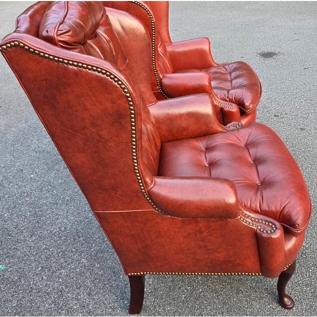 Wood Pair of Classic Leather Furniture Tufted Oxblood Leather Wingback Library Lounge Chairs With Brass Nailhead Trim, Circa 1980s For Sale - Image 7 of 14